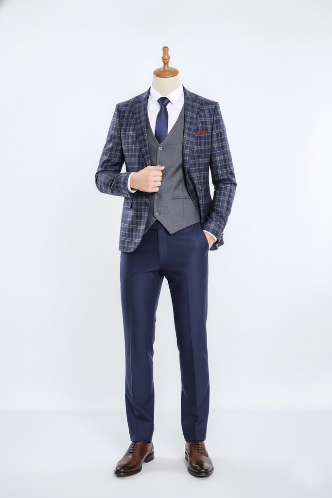 Checkered blazer, gray vest, and navy pants 